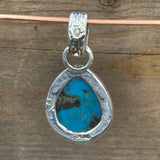 Turquoise Set in Sterling Silver with Floral Bail and 14k Accent