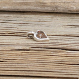 Sterling Silver Heart Pendant Inlaid with Faceted Dino Bone